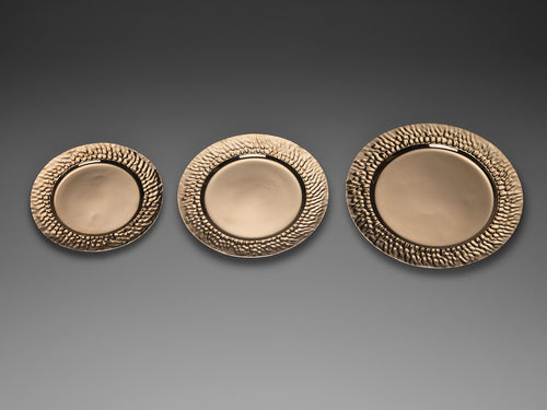 Bronze plates in order of size