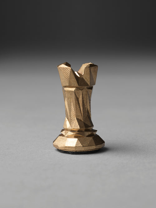 Multifaceted chess set in bronze - castle